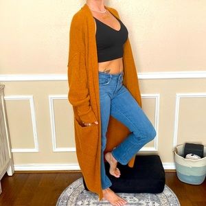 Free People cardigan size small rust orange long with pockets